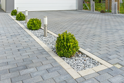 Interlocked Driveway with Shrubs Home Upgrade